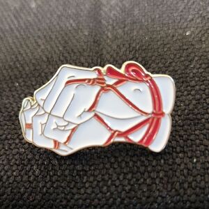 Elegant Red and White Hand Pin